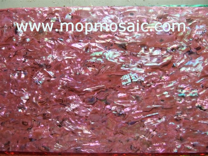Dyed pink abalone shell veneer